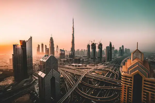 Dubai skyline at sunrise, with the Burj Khalifa