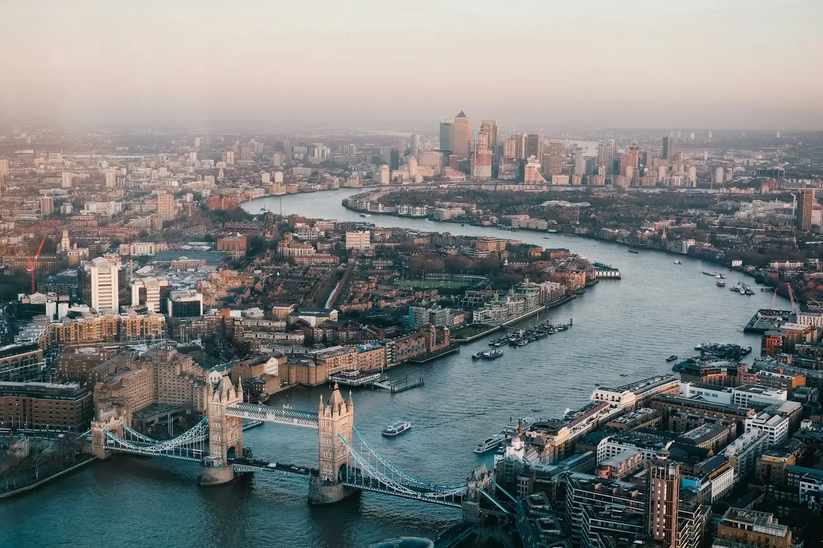 Aerial view of London and the River Thames, with Tower Bridge in the foreground